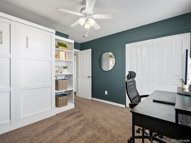 office area with ceiling fan and carpet flooring