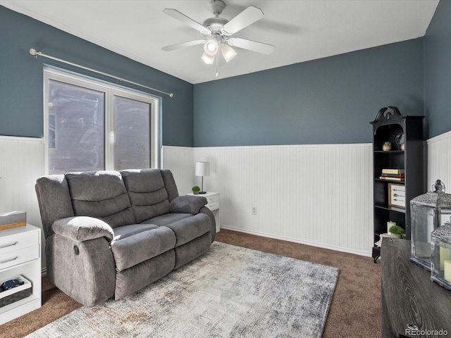 living room with carpet floors and ceiling fan