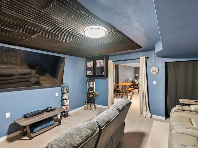 home theater room featuring carpet