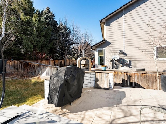 view of patio with grilling area