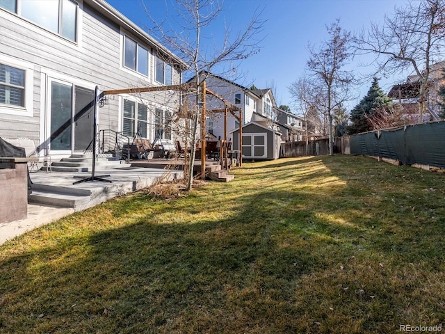 view of yard with a storage unit