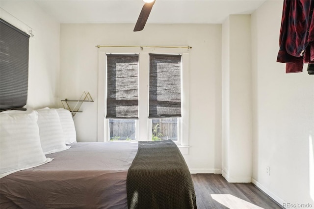 bedroom featuring wood-type flooring and ceiling fan