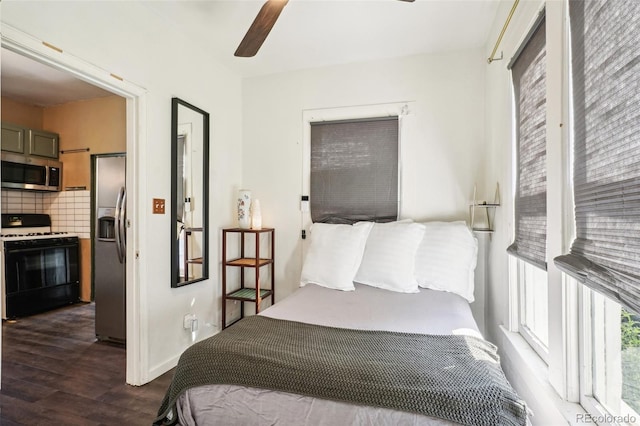 bedroom featuring stainless steel fridge with ice dispenser, dark hardwood / wood-style flooring, and ceiling fan