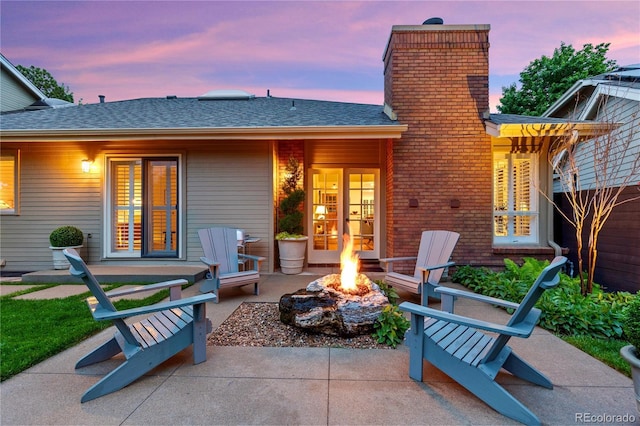 13 Pinyon Pine Rd, Littleton, CO 80127 - view of patio / terrace with an outdoor fire pit