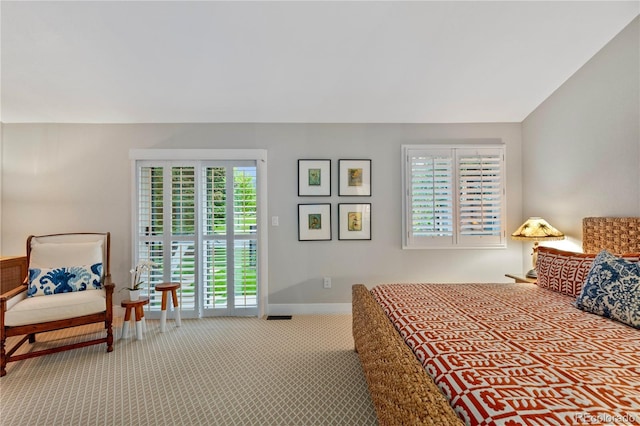 13 Pinyon Pine Rd, Littleton, CO 80127 - bedroom with carpet flooring, access to exterior, and baseboards