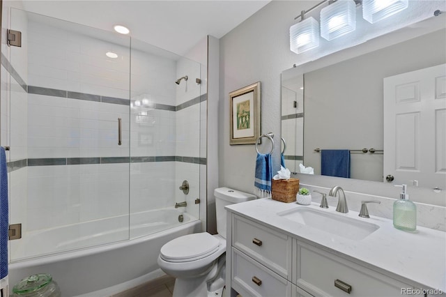 13 Pinyon Pine Rd, Littleton, CO 80127 - bathroom featuring vanity, toilet, and enclosed tub / shower combo
