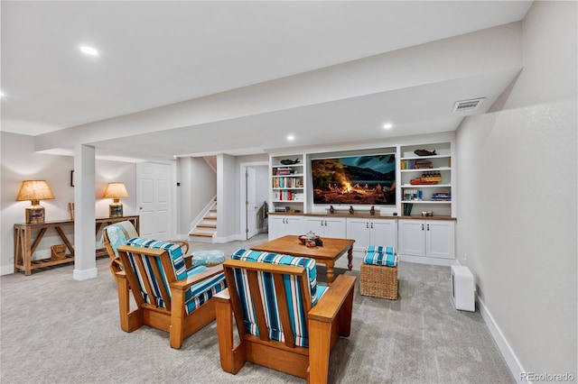 13 Pinyon Pine Rd, Littleton, CO 80127 - living room with light carpet, baseboards, stairway, and recessed lighting