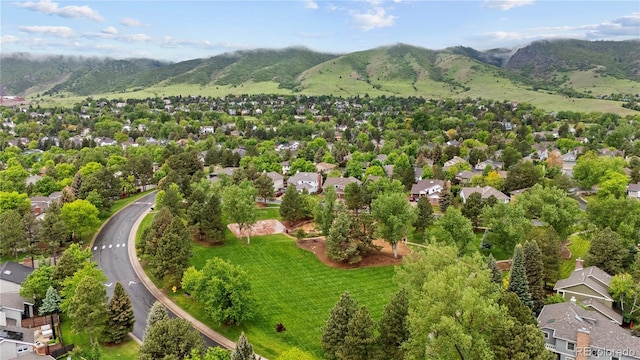 13 Pinyon Pine Rd, Littleton, CO 80127 - aerial perspective of suburban area with a mountain backdrop