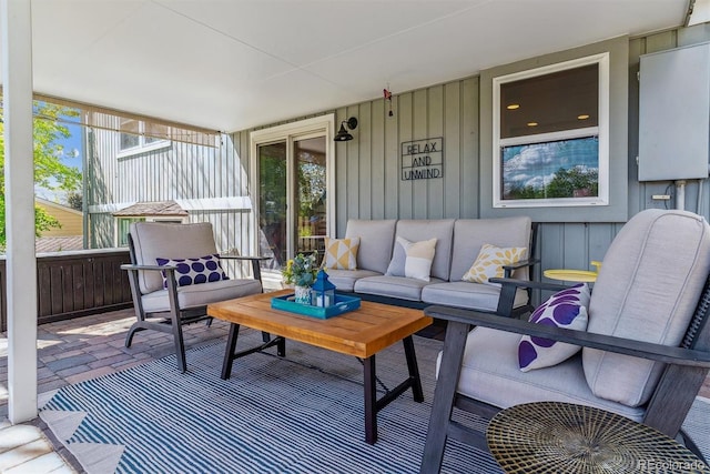 sunroom with outdoor lounge area