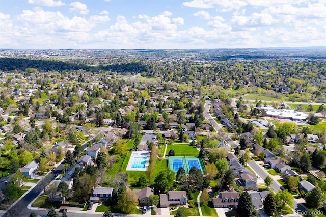 aerial view of residential area with a pool