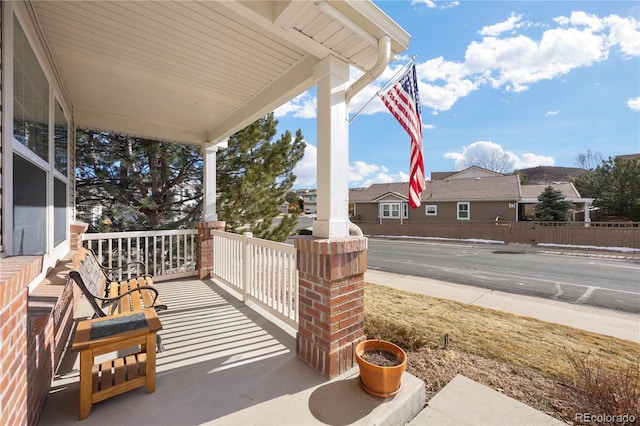 view of patio featuring a porch