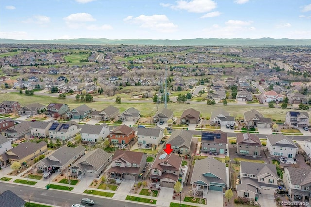aerial view with a residential view and a mountain view