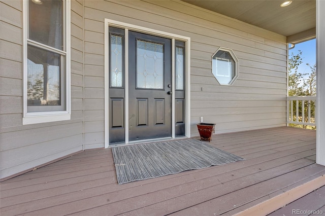 doorway to property with a deck