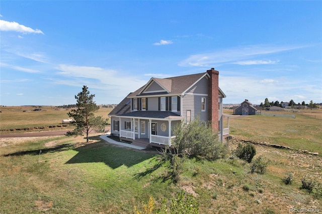 6696 Sunset Cir, Kiowa, CO 80117 - view of front of house with a porch, a chimney, a front yard, and a shingled roof