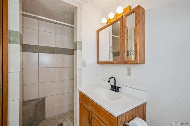 5818 S Skyline Dr, Evergreen, CO 80439 - full bathroom featuring tiled shower and vanity