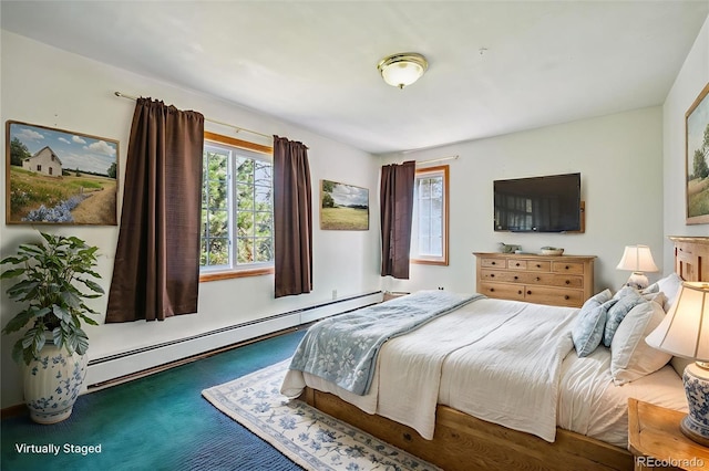 5818 S Skyline Dr, Evergreen, CO 80439 - bedroom featuring a baseboard radiator and carpet flooring