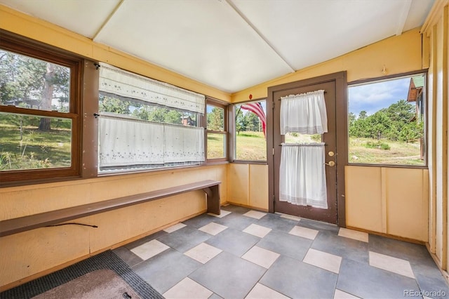 5818 S Skyline Dr, Evergreen, CO 80439 - unfurnished sunroom featuring vaulted ceiling and healthy amount of natural light
