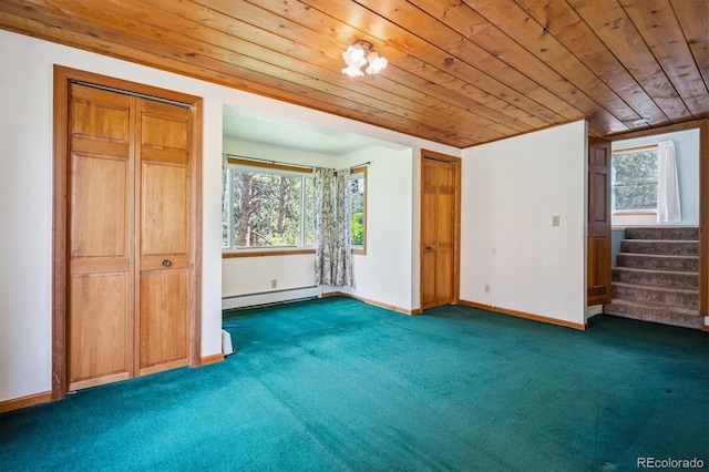 5818 S Skyline Dr, Evergreen, CO 80439 - unfurnished bedroom featuring wooden ceiling, carpet floors, and baseboard heating