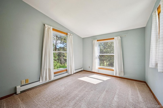 5818 S Skyline Dr, Evergreen, CO 80439 - empty room featuring a baseboard heating unit, vaulted ceiling, and carpet floors