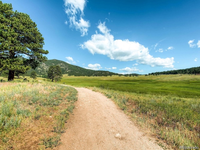 5818 S Skyline Dr, Evergreen, CO 80439 - view of street with a mountain view and a rural view
