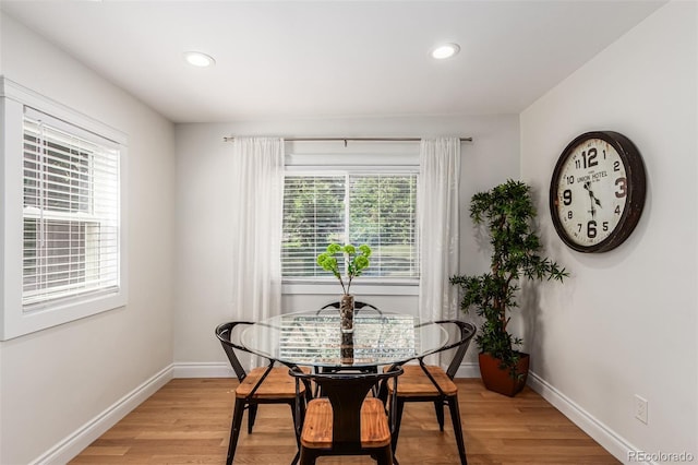 dining area with light wood-type flooring