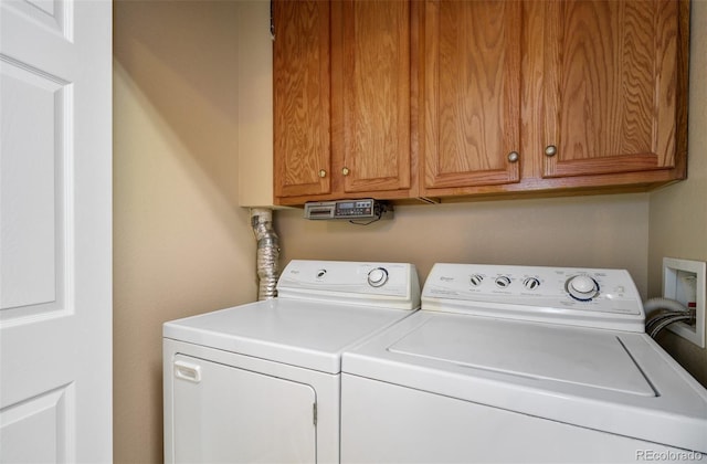 1343 Villa Grv, Monument, CO 80132 - laundry room with washer and clothes dryer and cabinet space