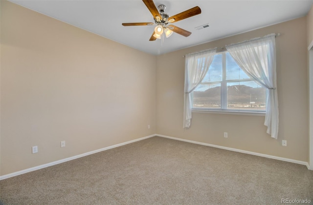 1343 Villa Grv, Monument, CO 80132 - unfurnished room with carpet floors, ceiling fan, and baseboards