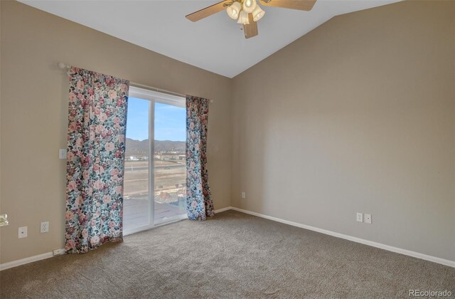 1343 Villa Grv, Monument, CO 80132 - carpeted spare room with a ceiling fan, vaulted ceiling, and baseboards