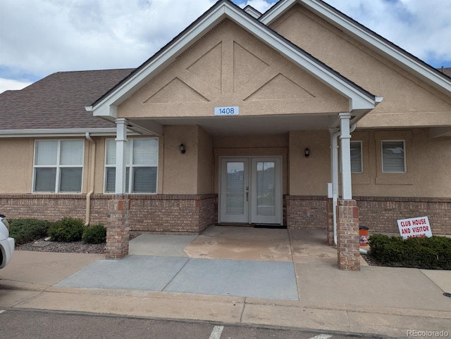 1343 Villa Grv, Monument, CO 80132 - view of exterior entry with brick siding and stucco siding
