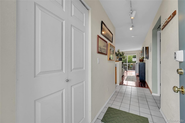 2850 Aurora Ave Unit 301, Boulder, CO 80303 - corridor featuring light tile patterned floors and baseboards