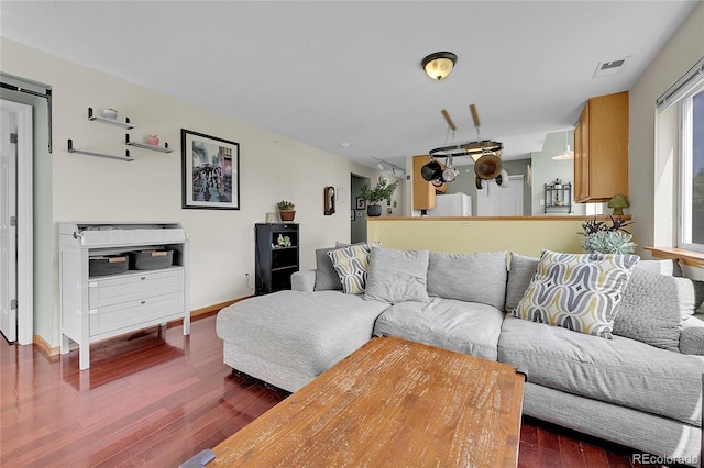 2850 Aurora Ave Unit 301, Boulder, CO 80303 - living room featuring dark wood-style flooring and baseboards