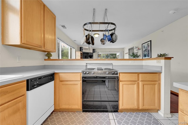 2850 Aurora Ave Unit 301, Boulder, CO 80303 - kitchen featuring range with electric cooktop, dishwasher, and light countertops