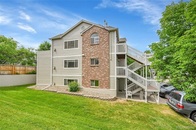 2850 Aurora Ave Unit 301, Boulder, CO 80303 - back of house featuring brick siding and stairway