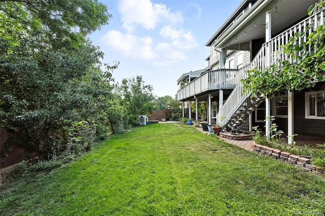 5731 S Yampa St, Centennial, CO 80015 - view of yard with stairs and a wooden deck