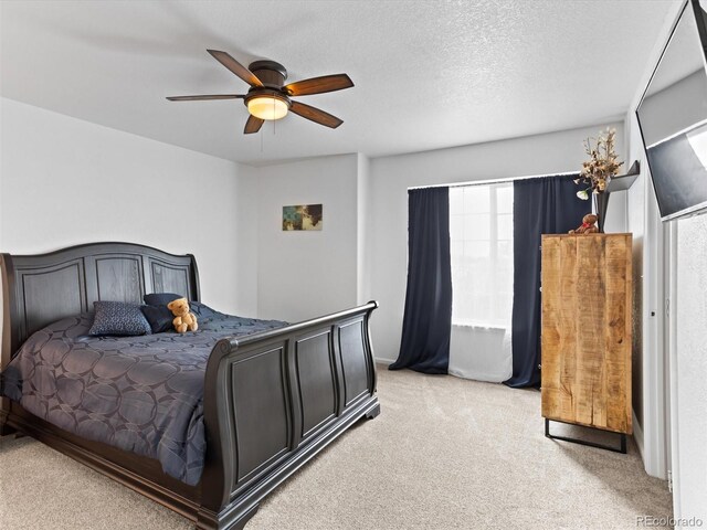 2468 Candleglow St, Castle Rock, CO 80109 - bedroom with light colored carpet and ceiling fan