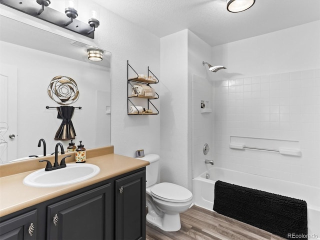 2468 Candleglow St, Castle Rock, CO 80109 - full bathroom with toilet, vanity, wood finished floors, and  shower combination