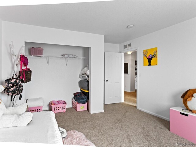2468 Candleglow St, Castle Rock, CO 80109 - bedroom featuring carpet floors, baseboards, and a closet
