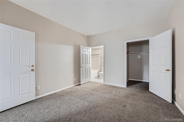 unfurnished bedroom featuring a closet and carpet flooring