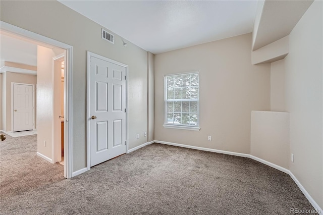 unfurnished bedroom with carpet