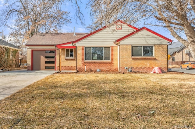 view of front of home with a garage and a front yard