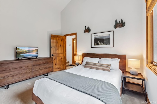1152 Ski Hill Rd, Breckenridge, CO 80424 - bedroom with carpet floors and high vaulted ceiling