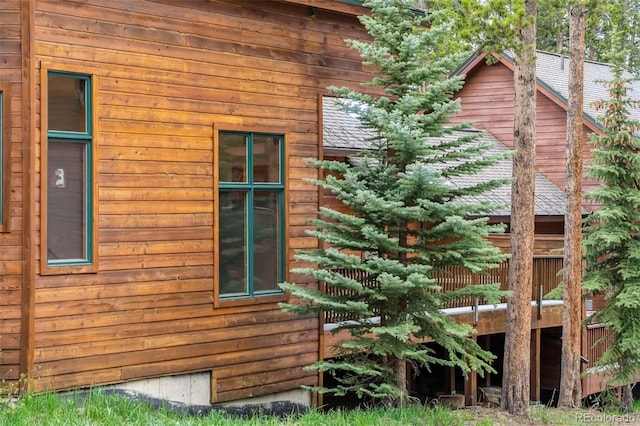 1152 Ski Hill Rd, Breckenridge, CO 80424 - view of home's exterior featuring a deck and a shingled roof