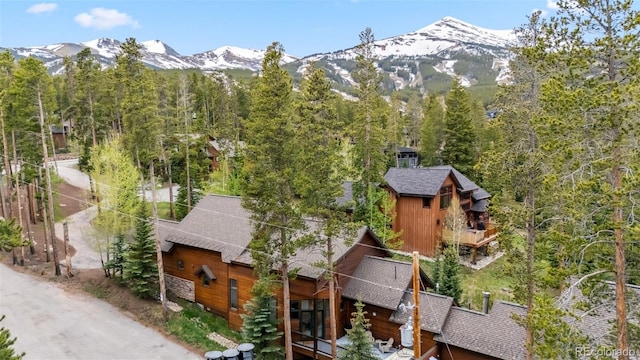 1152 Ski Hill Rd, Breckenridge, CO 80424 - aerial view of property and surrounding area featuring a mountain backdrop and a forest