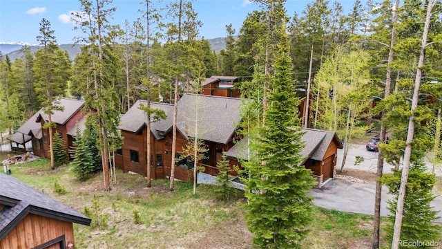 1152 Ski Hill Rd, Breckenridge, CO 80424 - aerial view of property and surrounding area featuring a heavily wooded area