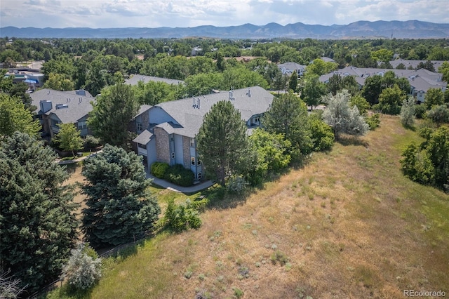 drone / aerial view featuring a mountain view