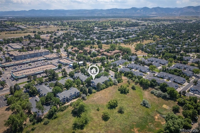 drone / aerial view featuring a mountain view