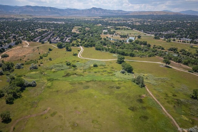 bird's eye view with a mountain view and a rural view