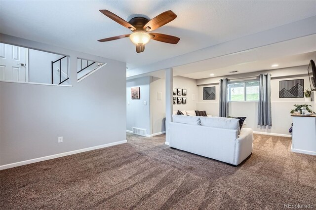 carpeted living area with baseboards, a ceiling fan, recessed lighting, and visible vents