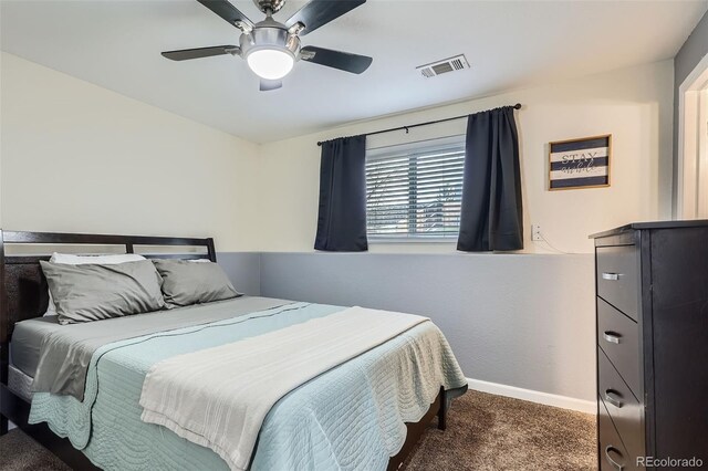 bedroom featuring visible vents, a ceiling fan, carpet, and baseboards