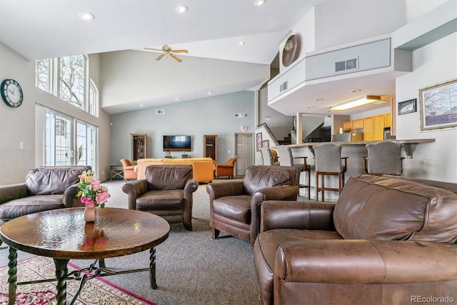 living room featuring high vaulted ceiling, ceiling fan, and carpet floors